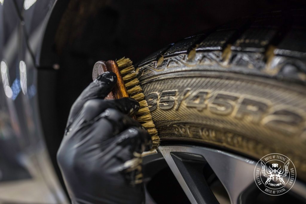 cleaning tire with a brush